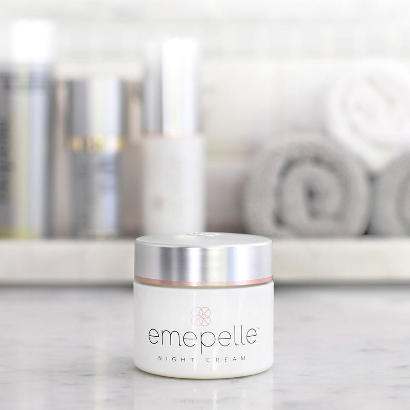 Emepelle Night Cream jar/container on bathroom vanity